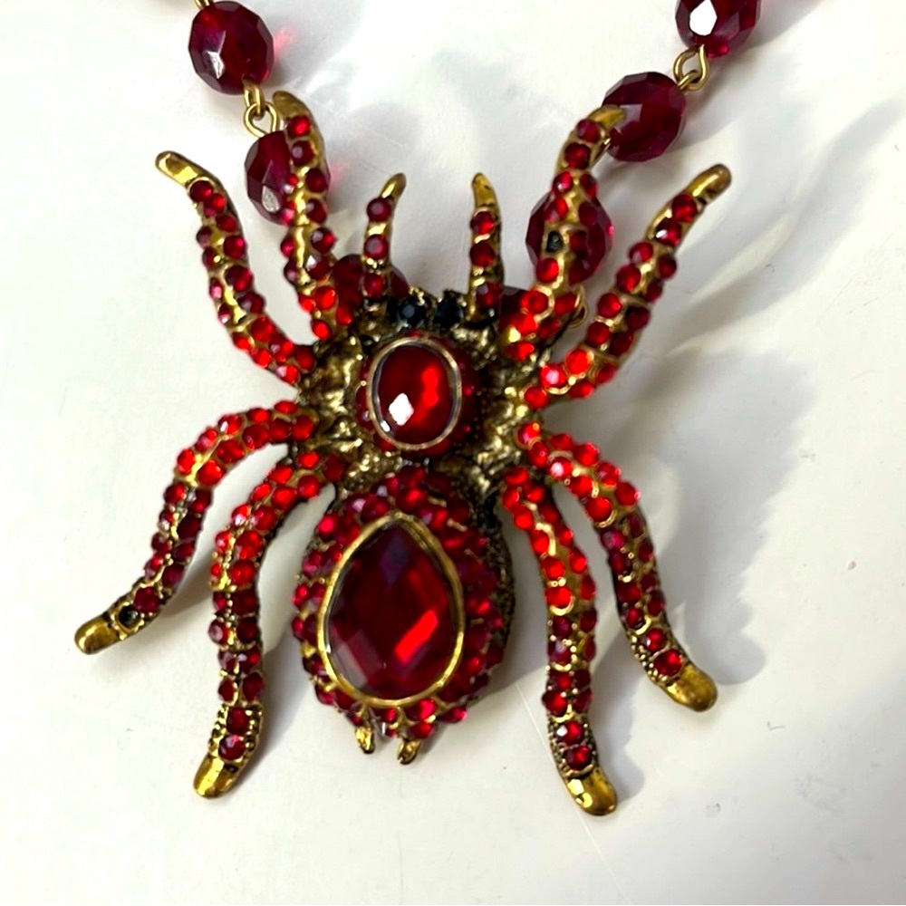 Handcrafted spider brooch made into a necklace w/gold tone wire & toggle closure